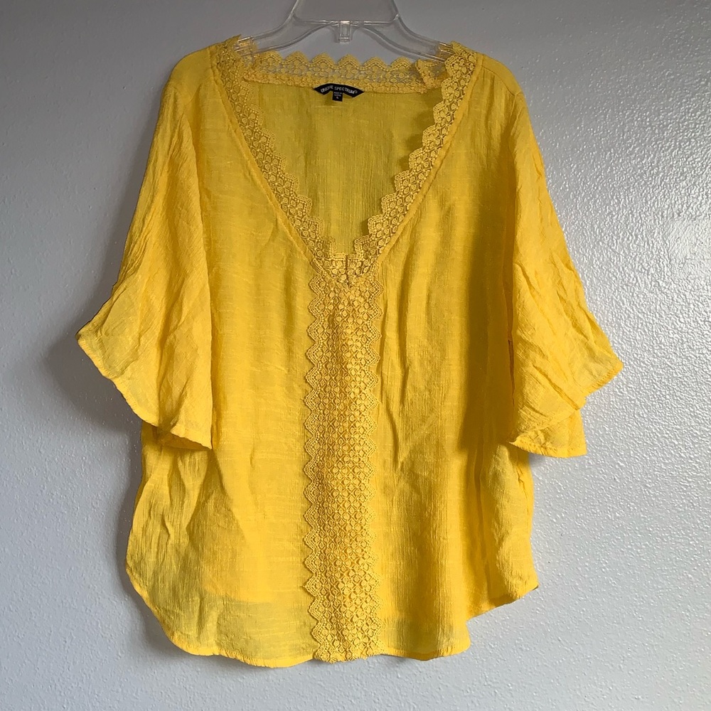 Unique Spectrum Yellow shirt. Lightly worn. L